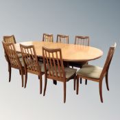 A 20th century teak G-plan oval extending dining table with leaf (total length 209cm) together