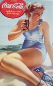 Coca Cola poster of a young 1950's girl drinking a bottle of Coca Cola as well as two 1992 Olympics