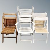 A pair of mid 20th century folding wooden chairs,