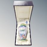 A miniature Moorcroft enamelled vase, height 8 cm, boxed.