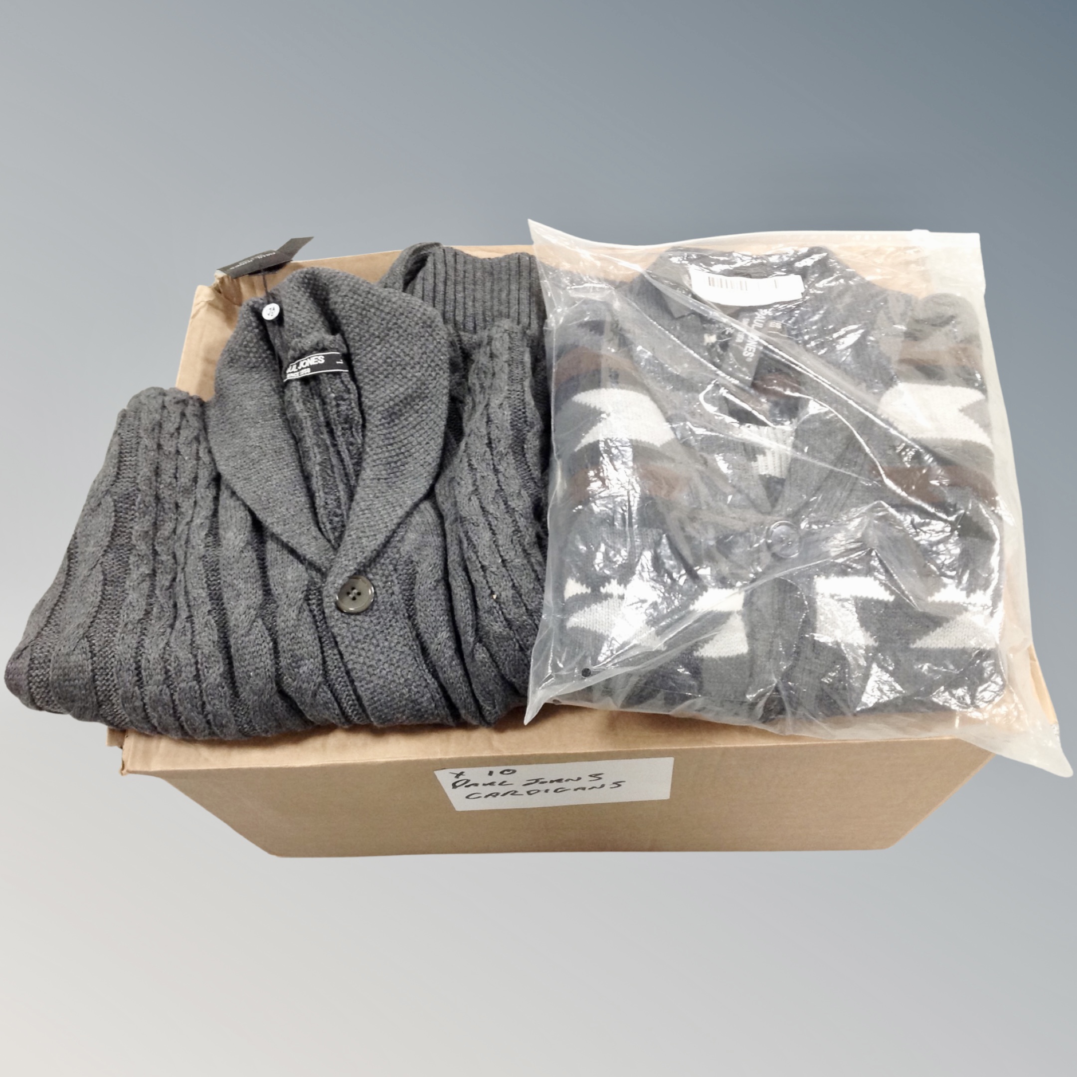 A box of ten Paul Jones cardigans, new.