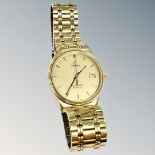 A gent's gold plated Omega Seamaster quartz calendar wristwatch, on Omega bracelet, case 31mm.