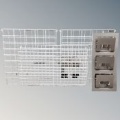 Three plastic-coated wire metal document racks together with a further document rack