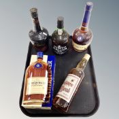 A tray of bottles of alcohol - Courvoisier 50cl and 70cl, Lindisfarne meade,
