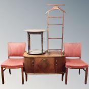 A mid century walnut gramophone cabinet on raised legs together with a pair of dining chairs,