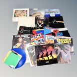 A box of vinyl records, Rod Stewart, The Stranglers, Pink Floyd, The Beach Boys,