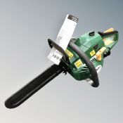 A petrol chain saw 37 cc with instruction book and accessories