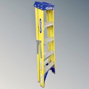 A set of folding Werner electrician's ladders