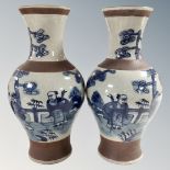 A pair of 20th century Chinese blue and white crackle glazed vases, height 46.5 cm.
