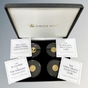 A set of four Jubilee Mint 9ct gold coins, boxed with certificates.