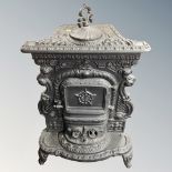 A French ornate cast iron log burner,