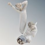 Three Lladro figures - Boy in night dress,