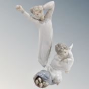 Three Lladro figures - Boy in night dress,