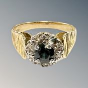 An 18ct gold sapphire and diamond cluster ring,