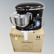 A Heska stand mixer with accessories in original box