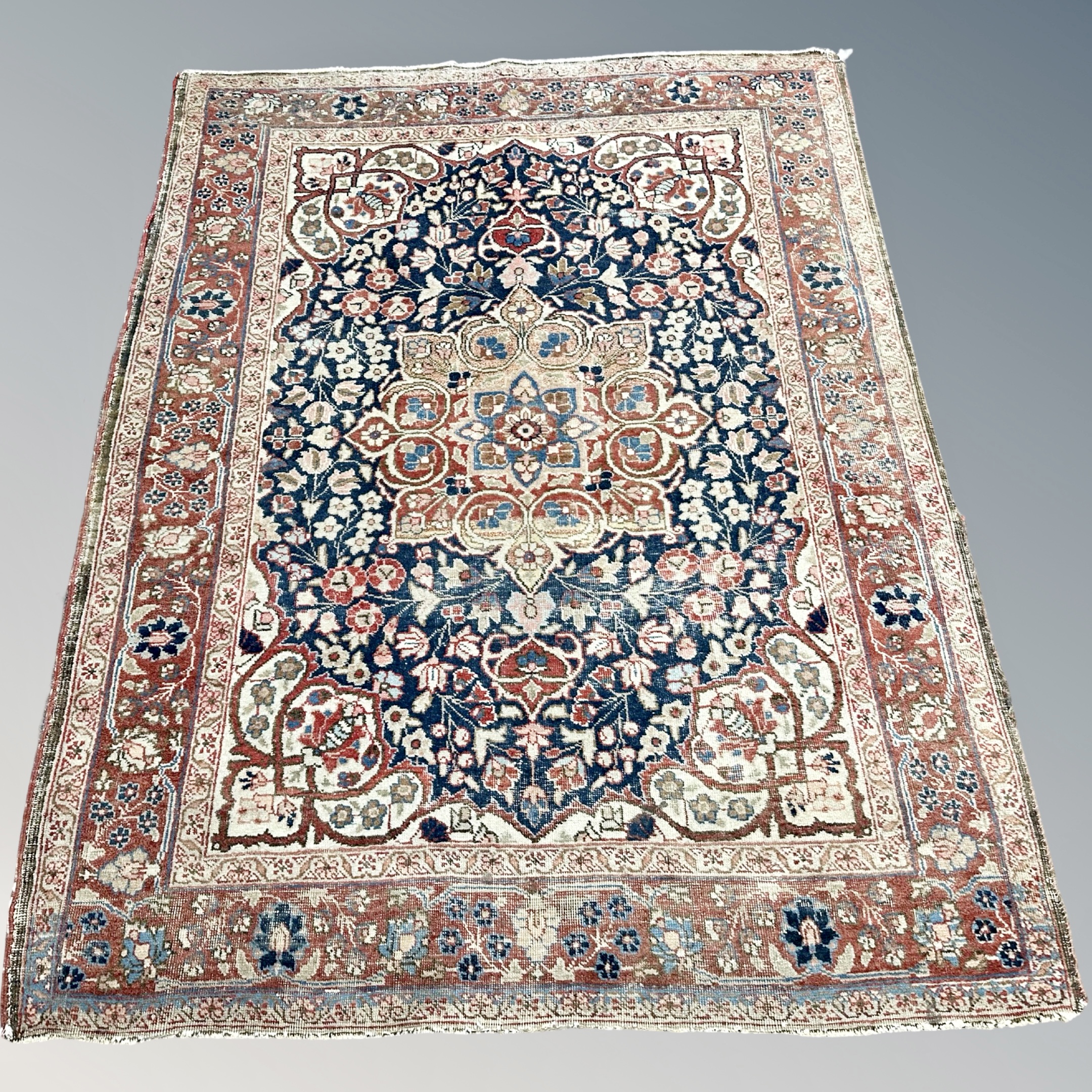 An antique Bakhtiari rug, West Iran, circa 1920, 188cm by 138cm.
