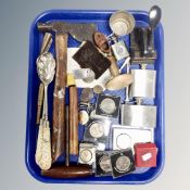 A tray of commemorative crowns, hand tools, hip flasks, medals,