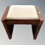 A mini stool storage piano stool