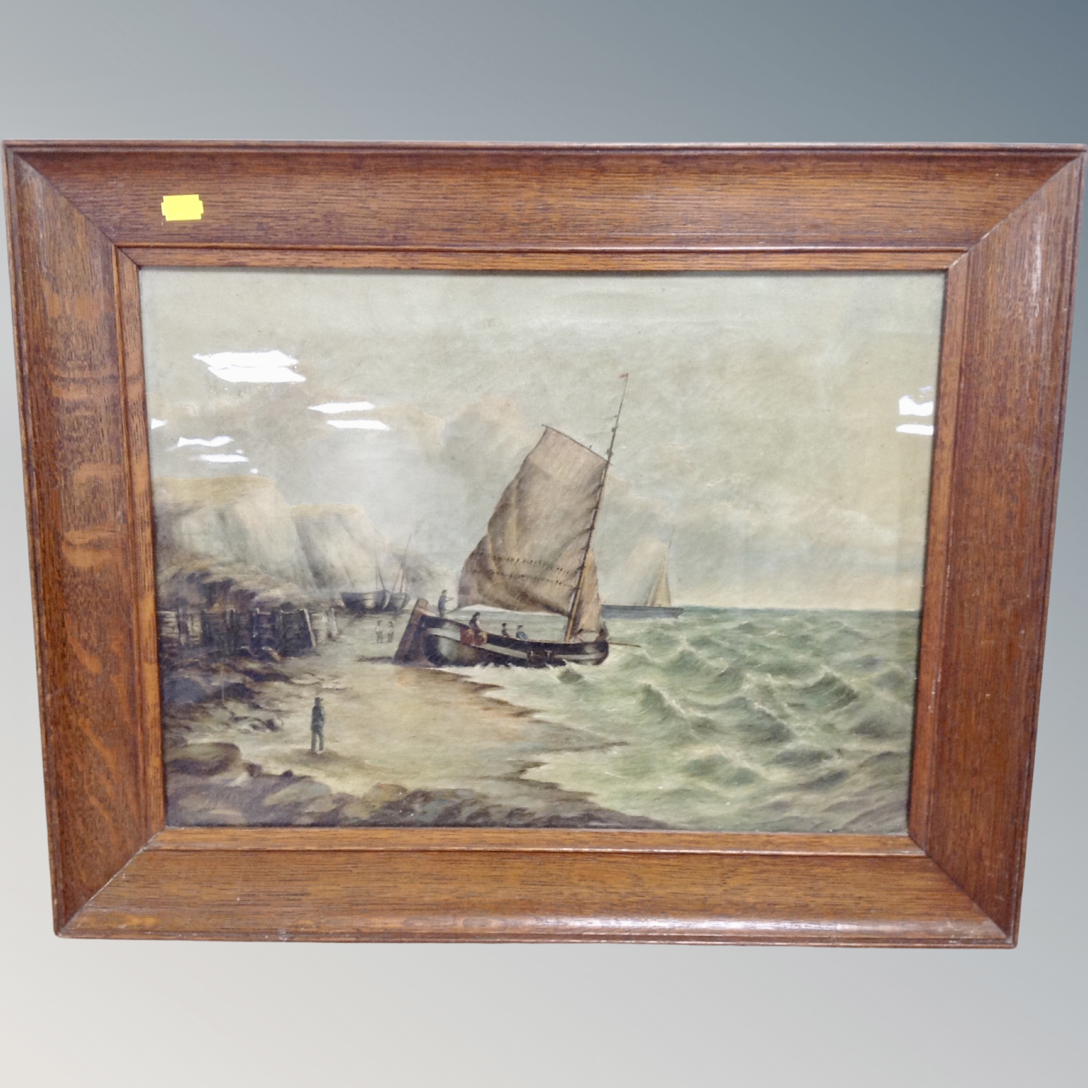LAte 19th century school, A boat launching off coast line, oil on canvas, indistinctly signed,