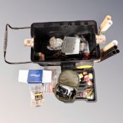 A plastic portable box containing fishing equipment, Penn rival 20LW reel, Shakespeare reel,