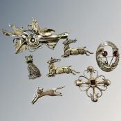 Seven silver and white metal brooches including Scottish thistle example,