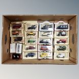 A box of die cast vehicles, Lledo, Day's Gone and Hamleys vehicles, enamelled badge,