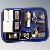 A tray of lighters, Ronson, enamelled pin badges, contemporary pocket watch,