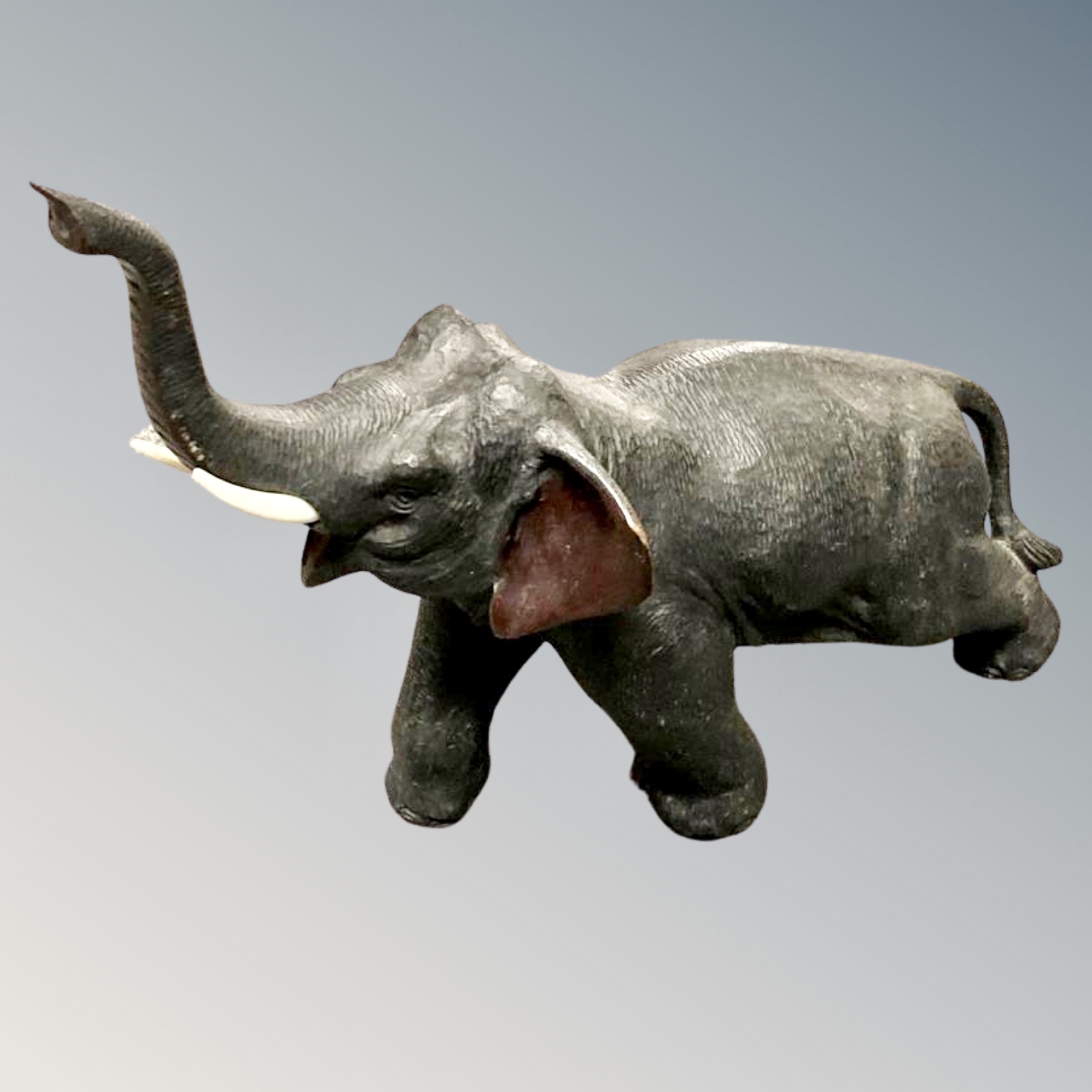 An early 20th century bronze figure of an elephant, height 22 cm.