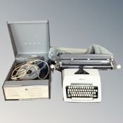 A mid century Bush portable electric record player together with an Olympic typewriter