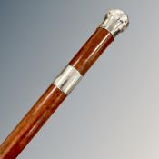 A Victorian malacca silver-mounted walking cane, the pommel engraved John Camozzi, Bicester, 1887,