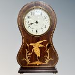 An Art Nouveau satinwood-inlaid mantel clock retailed by Goldsmiths Co, Newcastle, with key,