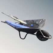 A garden wheel barrow with tools together with Bailey's cleaning rod set in carry bag