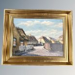 Twentieth century Continental School: A cobbled street scene, oil on canvas, 39 cm x 29 cm. Framed.