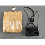 A Zara black top handled two-way bag (ne