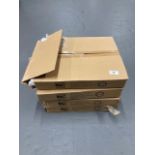 Four boxes of white disposable swing bin