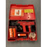 A Hilti DX 450 nail gun in box