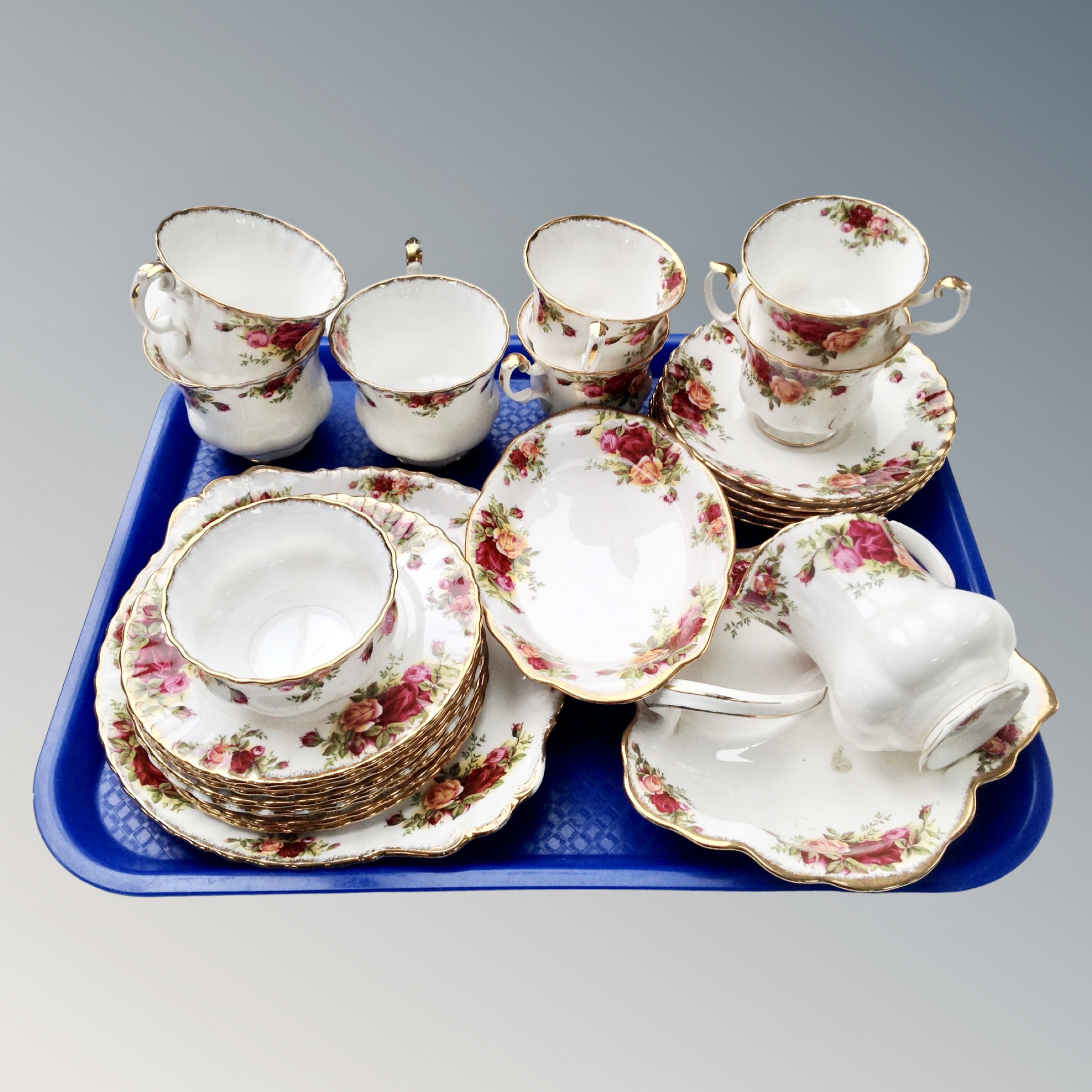 A tray containing a Royal Albert Old Country Roses part tea set.