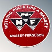 A cast iron plaque, Massey Ferguson.