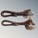 Two antique cast iron animal head can openers.