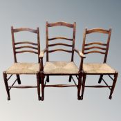 A set of six beech ladder backed farmhouse kitchen chairs (carver and five singles)