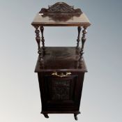 A Victorian mahogany coal receiver on legs