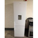 An Electra upright fridge/freezer with water dispenser.