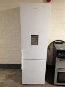 An Electra upright fridge/freezer with water dispenser.