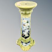 A 19th century hand painted pottery plant pedestal.