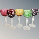 A harlequin set of five Bohemian cut to clear hock glasses