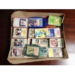 A box containing vintage card games and Top Trumps.