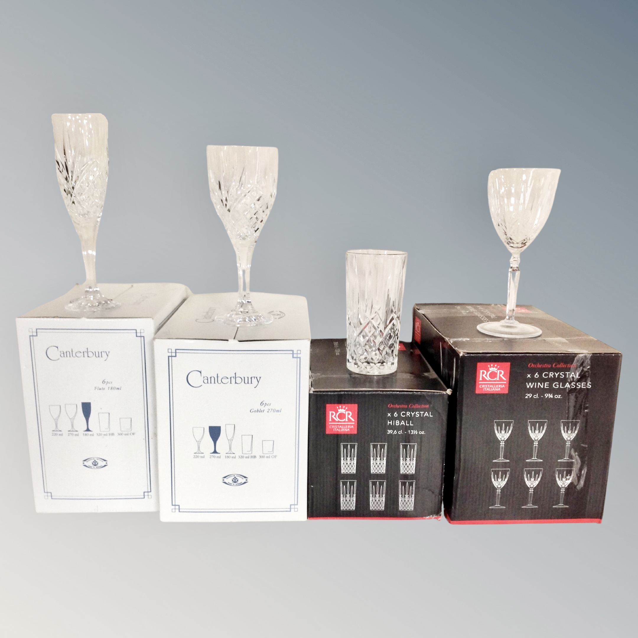 Two boxed sets of six Canterbury lead crystal glasses together with a set of four crystal wine