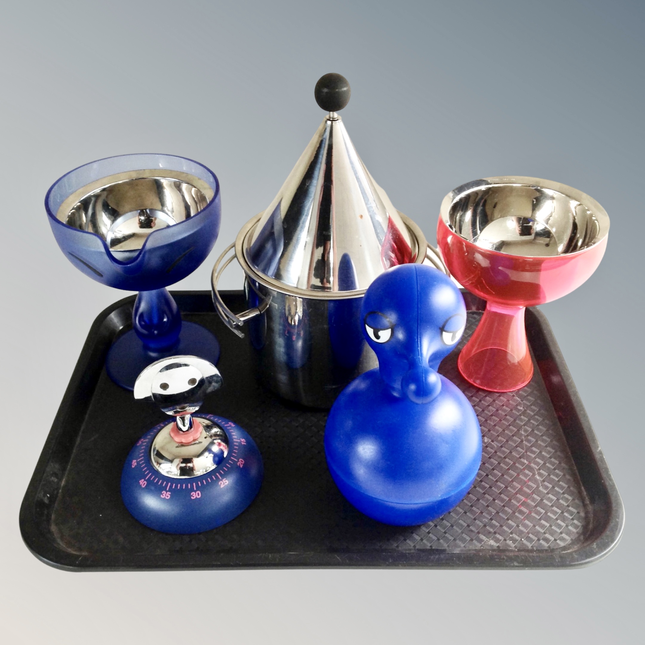 A tray of Alessi kitchenware items.