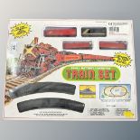 A 26 piece battery operated die cast train set.