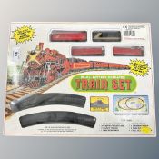 A 26 piece battery operated die cast train set.